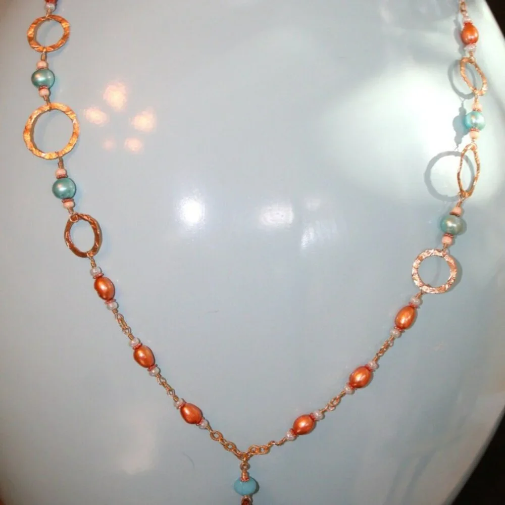Hand made gold necklace with‎ gold and blue fresh water pearls